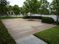 Newly poured concrete patio and pad for commercial office building